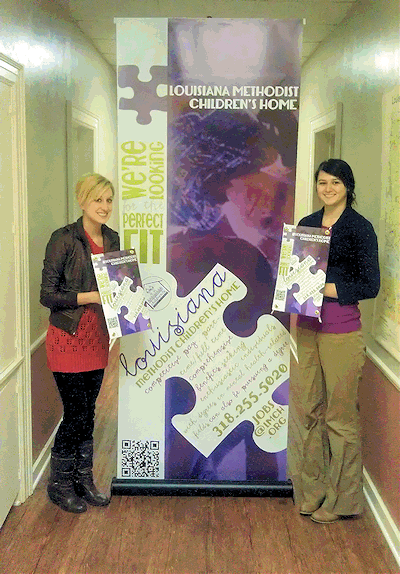 Designed by Jessica Pullin (left) and co-modeled by Savanah Knight (right), our new Job Fair banner is great!